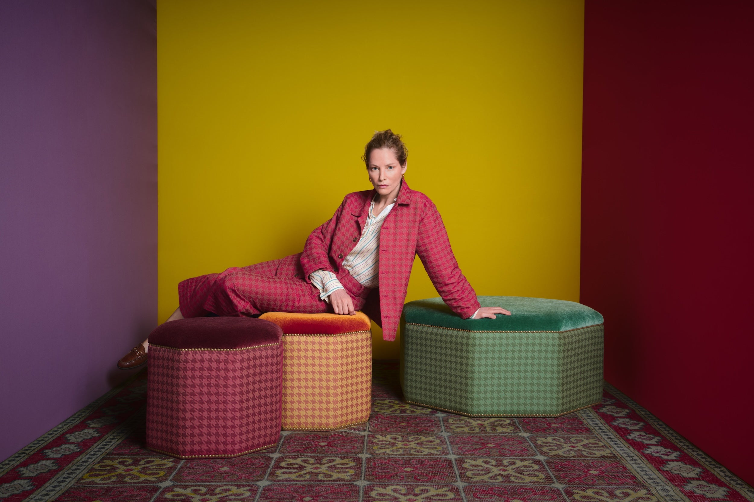 Sienna wears work jacket and work trousers in crimson Walter fabric by Flora Soames