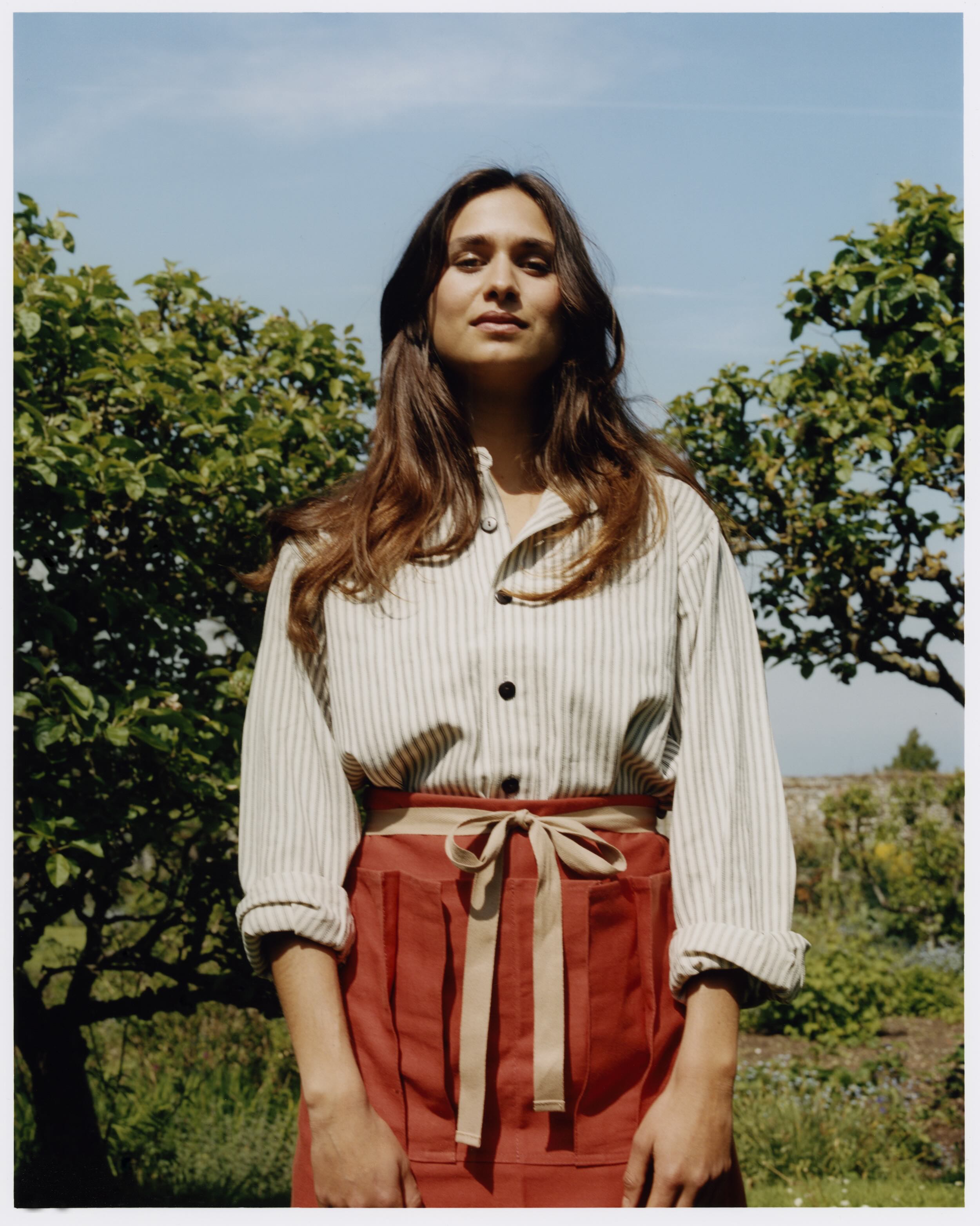 Woman Wears Carrier Company Gardener's Half Apron