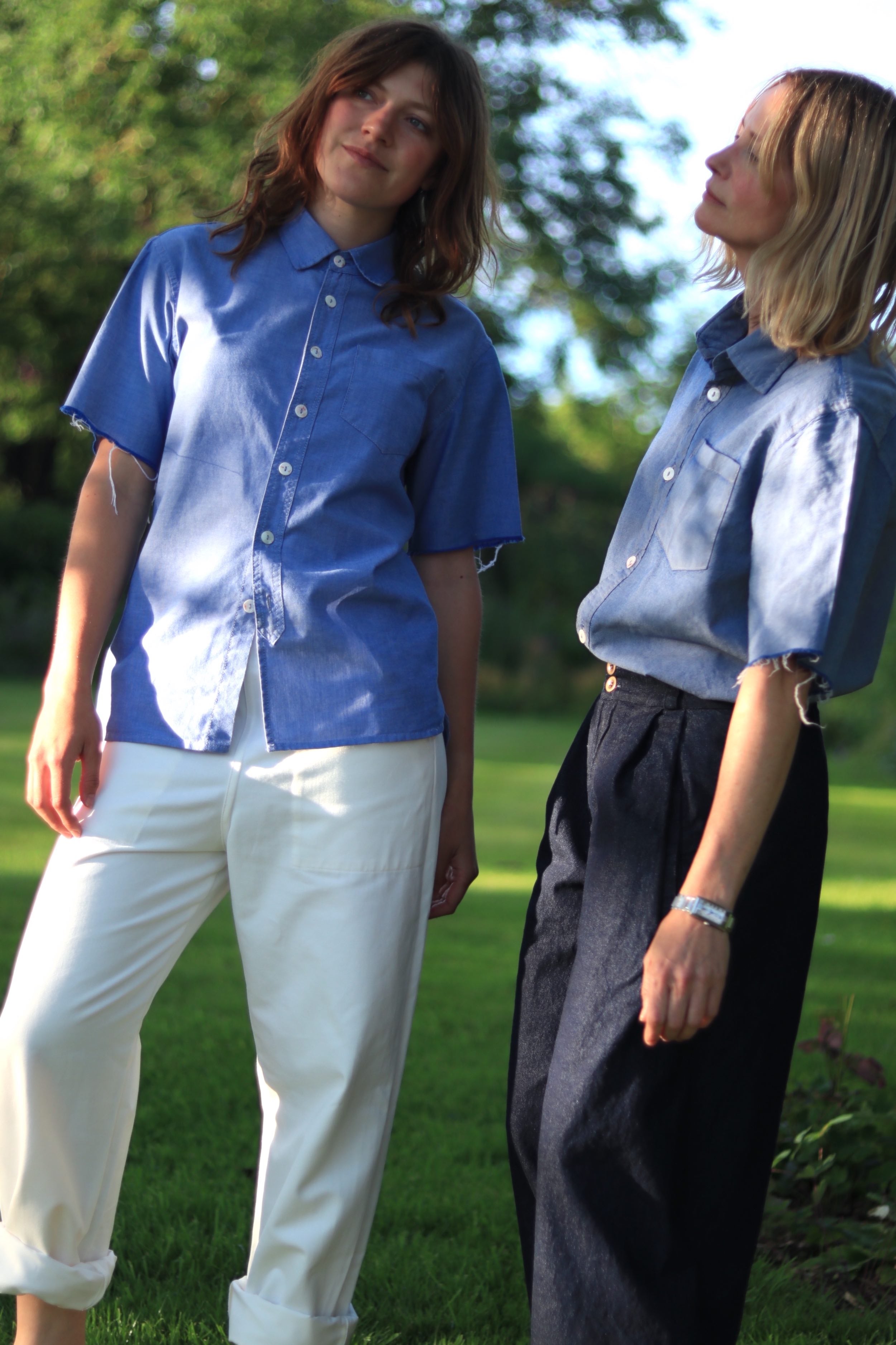 Minna wears Carrier Company Women's Work Trouser in White with Pinpoint Chambray Shirt